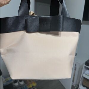 Elegant Cream Tote Bag with Black Accents